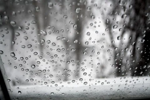 Raindrops on glass window Stock Photos