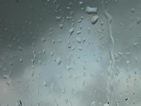 Raindrops on gray and blue Stock Footage 821577