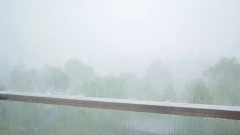 Raindrops hit the railing, heavy rain, downpour 動画素材 90096533