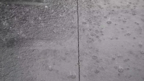 Raindrops Hitting The Floor In A Storm, UK 動画素材 138210382