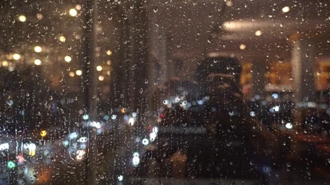 Raindrops on the hotel window at night Stock-Footage 303754221