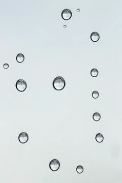 Raindrops macro on a window Stock Photos
