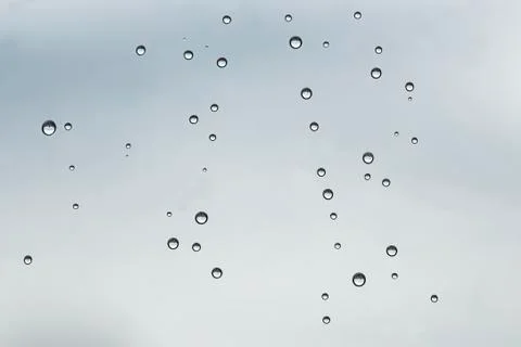 Raindrops macro on a window Stock Photos