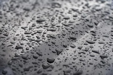 Raindrops on Metal Surface - Perfect for Patterns and Backgrounds Stock Photos