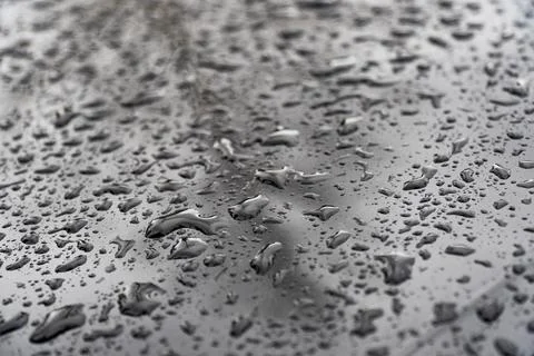 Raindrops on Metal Surface - Perfect for Patterns and Backgrounds Stock Photos