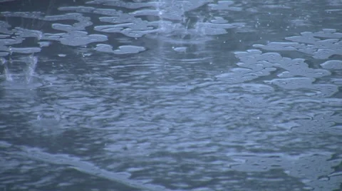 Raindrops on a metal table Stock Footage 32508174