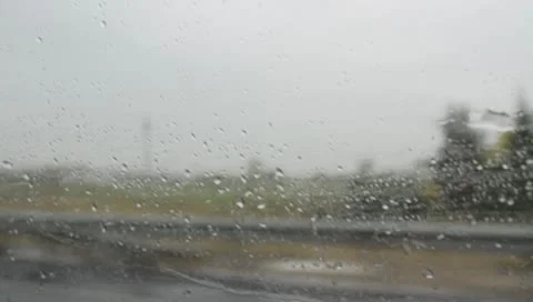 Raindrops on moving car window Stock Footage 8946923