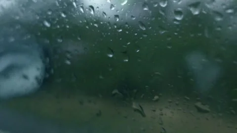 Raindrops on moving car window glass Stock-Footage 333622158