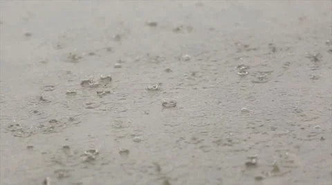 Raindrops on the pavement Stock Footage 34391545