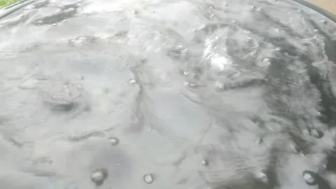 Raindrops in a plastic tub Stock Footage 296083656