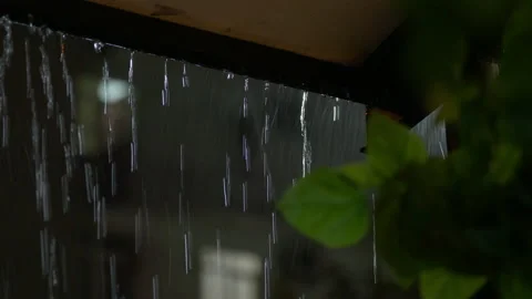 Raindrops pour from the roof Stock Footage 228800528