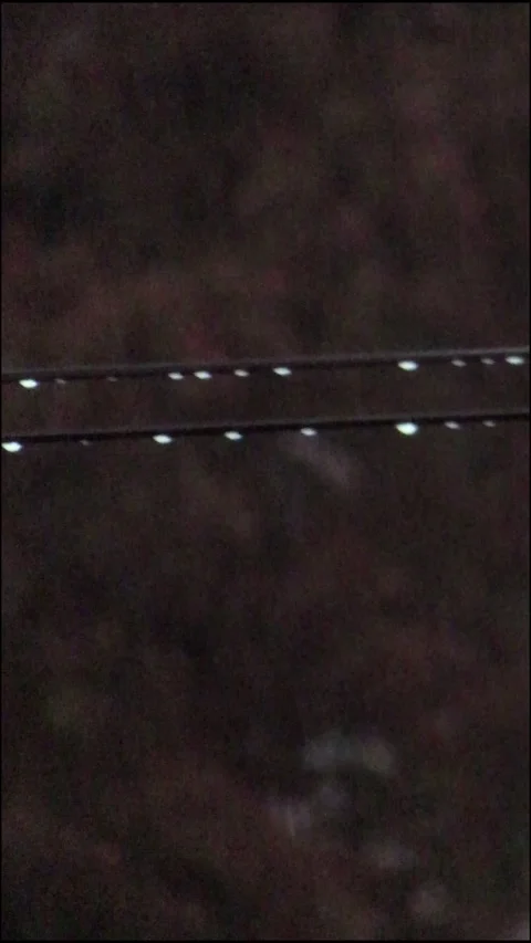 Raindrops on Power Line During Storm - Vertical 4K 스톡 동영상 336340141