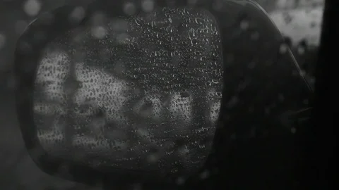 Raindrops on the rearview mirror Stock Footage 116471098
