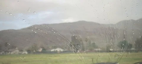 Raindrops removed by windshield wipers Stock Footage 126082470