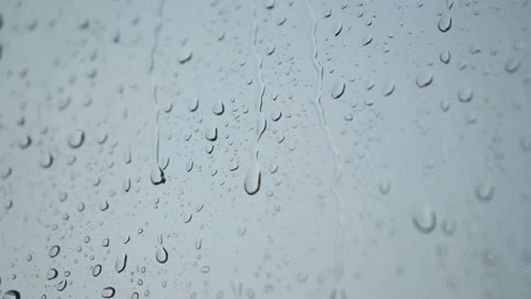 Raindrops roll down on the window. Bad depressive weather, heavy rain and wind Stock Footage 162490165