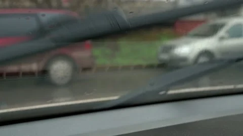 Raindrops run down the car window. it's raining, it's bad weather outside Stock Footage 165988908