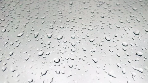 Raindrops run down the glass close-up Stock Footage 88552776