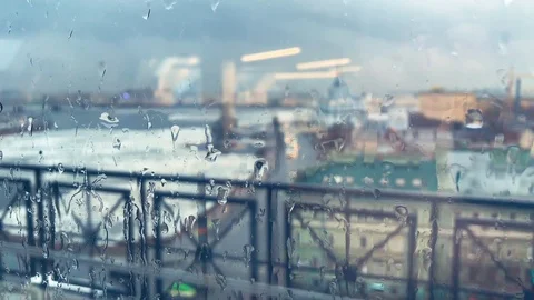 Raindrops run down the glass close up Stock Footage 88552779