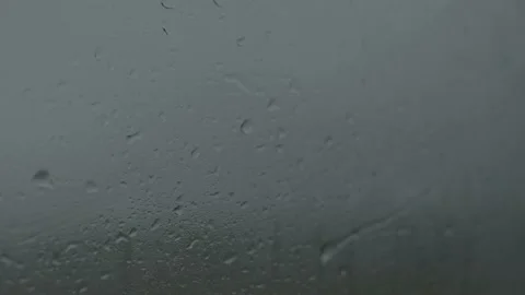 Raindrops run down the glass Stock Footage 201266673