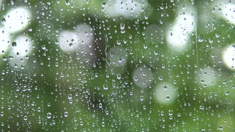 Raindrops run down the glass of the window. Stock-Footage 136834963