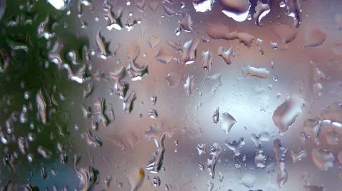 Raindrops running down the glass windows (1) Stock Footage 42125749