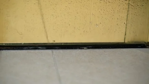 Raindrops on Shower Glass Panel Stock Footage 311141304