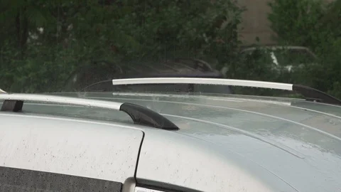 Raindrops on a silver car close-up Stock Footage 109392857