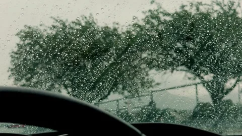 Raindrops Sliding Down Car Windshield Stock Footage 345986145