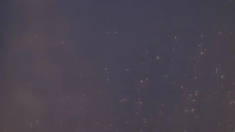 Raindrops sliding over an aeroplane window during takeoff - 3840 x 2160 @ 50fps Stock Footage 240352853