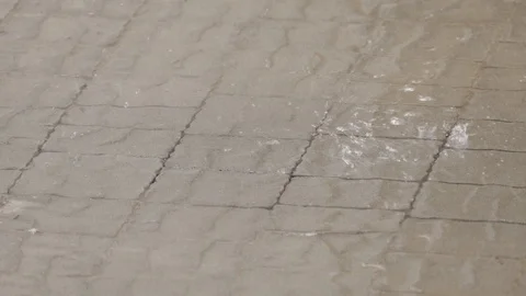 Raindrops slow falls at cobblestone Stock Footage 115715581