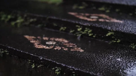 Raindrops on the steps of the stairs Stock Footage 222404177