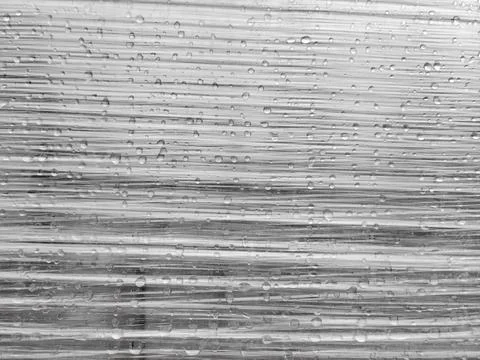 Raindrops on Stretched Plastic Stock Photos