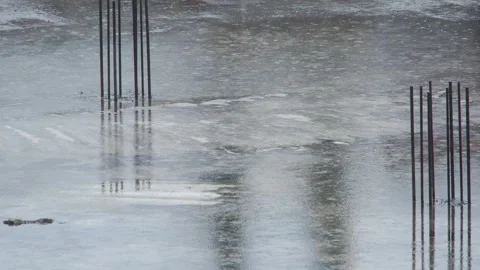 Raindrops on the surface of the puddle. Rainy day. Stock Footage 309007326