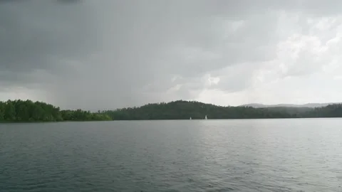 Raindrops on the surface of the Solina Lake, Carpathians 動画素材 237456403