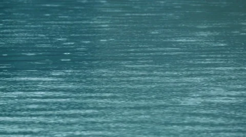 Raindrops on the surface of the water Stock Footage 51757710