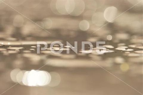 Raindrops on table Bokeh focus Stock Photos