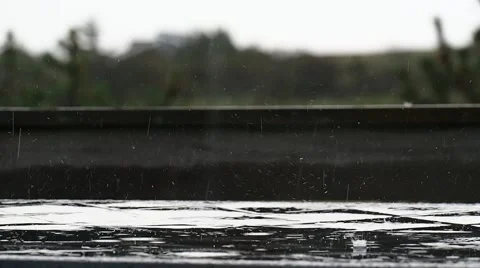Raindrops on a table  Stock Footage 52701024
