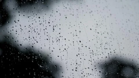 Raindrops texture on the glass window frame Foto stock