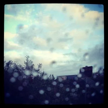 Raindrops through the window Fotos Stock