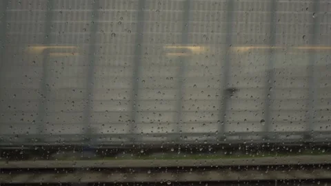 Raindrops on a train window Vídeo Stock 332883219