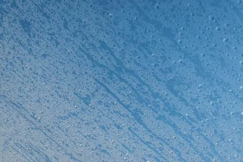 Raindrops on transparent surface Stock Photos