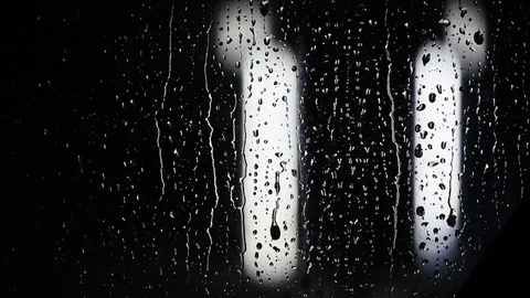 Raindrops of water on black window background. Stock Footage 83422432