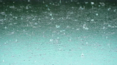 Raindrops on the water closeup Stock Footage 53856891