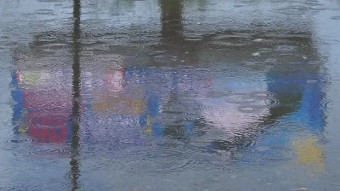 Raindrops Water Reflection on Asphalt , Rotating Billboard Transitions Stock Footage 218169240
