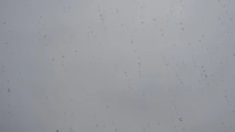 Raindrops on the window against the background of the city Stock Footage 129187306