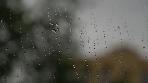 Raindrops on the window in the apartment house Stock Footage 129190426