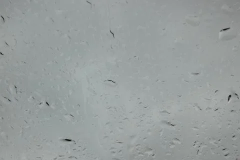 Raindrops on the window background Stock Photos