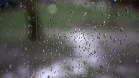 Raindrops on the window, blurred background Stock-Footage 128133995