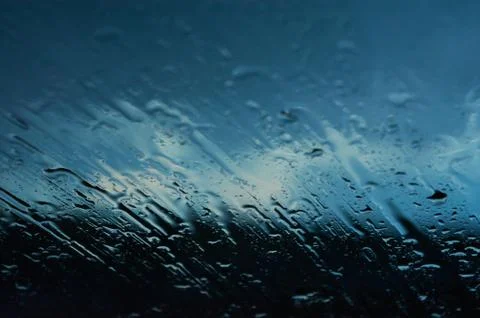 Raindrops on the window of a car Stock Photos