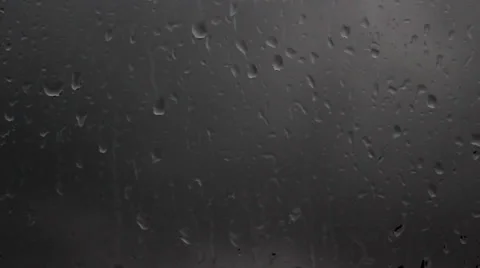 Raindrops on Window. Dark Clouds in Background. Time lapse. Video stock 39615803